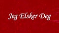 I Love You text in Norwegian Jeg Elsker Deg formed from dust and turns to dust horizontally on red background