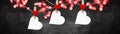 I love you, Valentine`s Day background banner panorama - White heart hang on wooden clothes pegs with wooden heart on a string Royalty Free Stock Photo