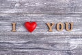 I love you, wooden lettering, gray background, postcard Happy Valentine day, flat lay Royalty Free Stock Photo