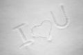 I love you written by hand in the fresh snow at sunny day. Royalty Free Stock Photo