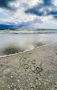 I love you written in sand