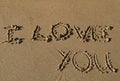 I love you written in sand Royalty Free Stock Photo