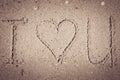 I love you written on the sand Royalty Free Stock Photo