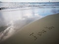 I love you written on the sea shore background. Royalty Free Stock Photo