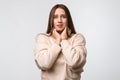 Portrait of the scared woman with long chestnut hair