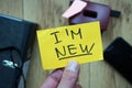 I'm new written on a memo at the office Royalty Free Stock Photo