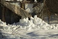 I`m on old barn. Snow fell from cabin. Snowy winter in Russia Royalty Free Stock Photo