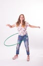 Girl with hula hoops on a white background Royalty Free Stock Photo