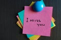 I miss you note on sticker on the fridge