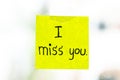 I miss you word on sticky note