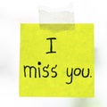 I miss you word on sticky note