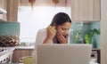 I must have bitten down too hard. a young businesswoman suffering from a tooth ache while eating an apple at home.