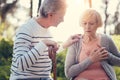 Cheerless senior woman feeling pain in the chest