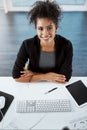 I pride myself in being productive. High angle portrait of a young businesswoman working at her desk in a modern office. Royalty Free Stock Photo