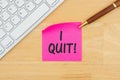 I quit on a sticky note with a keyboard with pen Royalty Free Stock Photo