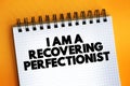 I Am A Recovering Perfectionist text on notepad, concept background