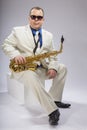 Saxophonist Caucasian soloist plays the saxophone Royalty Free Stock Photo