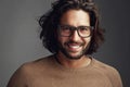 I see it and Im digging it. Studio shot of a handsome young man posing against a gray background. Royalty Free Stock Photo