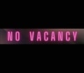 Vintage Pink neon No Vacancy sign.