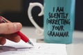 `I am silently correcting your grammar` coffee mug