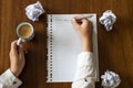 I am sorry written on paper with coffee on wooden table hands of a person Royalty Free Stock Photo