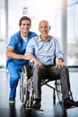 I strive for the most positive outcome for my patients. Portrait of a male nurse caring for a senior patient in a Royalty Free Stock Photo