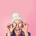 I sugarcoat everything. a young woman covering her eyes with cookies against a colorful background. Royalty Free Stock Photo