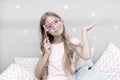 I am super star. Girl with long blonde curly hair posing photo booth props. Pajamas party concept. Girl star shaped