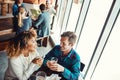 I think I found the one. a young couple having drinks in a bar with people blurred in the background. Royalty Free Stock Photo