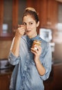 I think Im addicted to peanut butter. a young woman eating peanut butter out of the jar with a spoon. Royalty Free Stock Photo