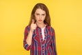 I told you! Portrait of angry ginger girl in checkered shirt looking at camera and blaming warning you with raised finger