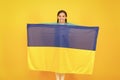 I am ukrainian and proud of it. Patriotism love Ukraine motherland. National identity. Girl with blue and yellow