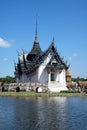 Ancient white temple on water view