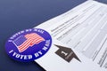 `I Voted By Mail` sticker and Absentee Voter Application Vote by Mail Form