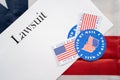 I voted by mail stickers on Lawsuit paper with US flag as background - Concept of lawsuits in USA election