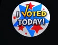 I voted sticker on black background