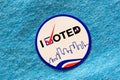 I Voted sticker on a blue shirt indicating Democrat party. Royalty Free Stock Photo