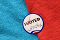 I Voted sticker split between red and blue materials indicating both Democrat and Republican party. Royalty Free Stock Photo