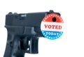I voted today campaign button with hole on handgun for voter suppression