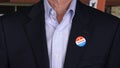 Senior caucasian man in formal clothing with Voted sticker