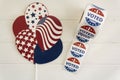 I Voted Today stickers and USA balloons on white wooden table. US presidential election concept Royalty Free Stock Photo