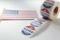 I Voted Today stickers and USA flag on white background. US presidential election concept