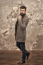 I am waiting for you. Casual style. Bearded hipster autumn style clothes. Guy in fall coat. Clothing alterations, custom