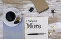 I Want More - Copybook on the desktop Royalty Free Stock Photo