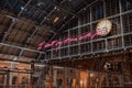 I want my time with you glowing pink words installation by Tracey Emin within interior of St. Pancras, London, UK
