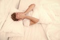 I want to sleep. early morning wakeup. sleep disorders concept. man has sleep problems. man lying white bedroom. time to Royalty Free Stock Photo