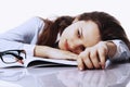 I want to sleep. Young business woman tired from office work wit Royalty Free Stock Photo