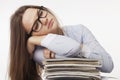 I want to sleep. Young business woman tired from office work wit Royalty Free Stock Photo