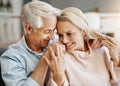 I only want to spend my life with you. a happy mature couple relaxing on the sofa at home. Royalty Free Stock Photo