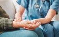 I want you practice meditation. Shot of a nurse checking the pulse of her elderly patient. Royalty Free Stock Photo